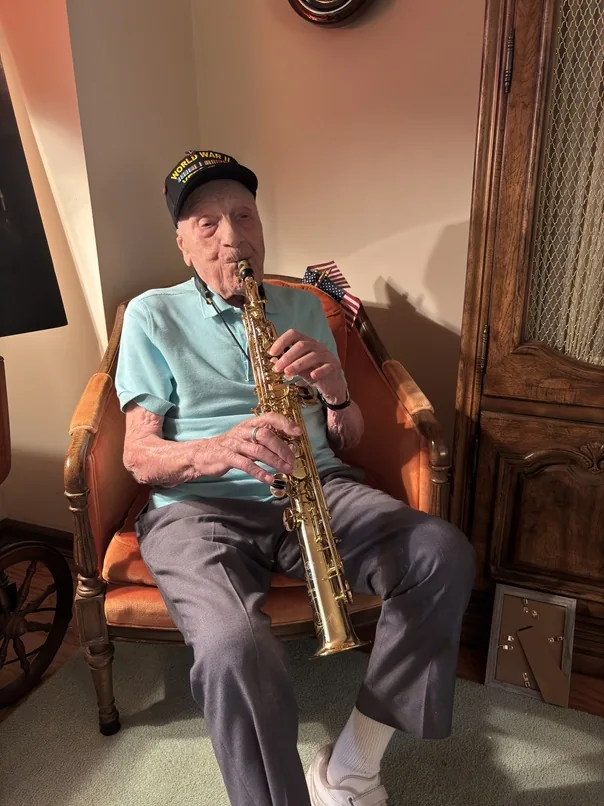 Dominick Critelli playing the saxophone.