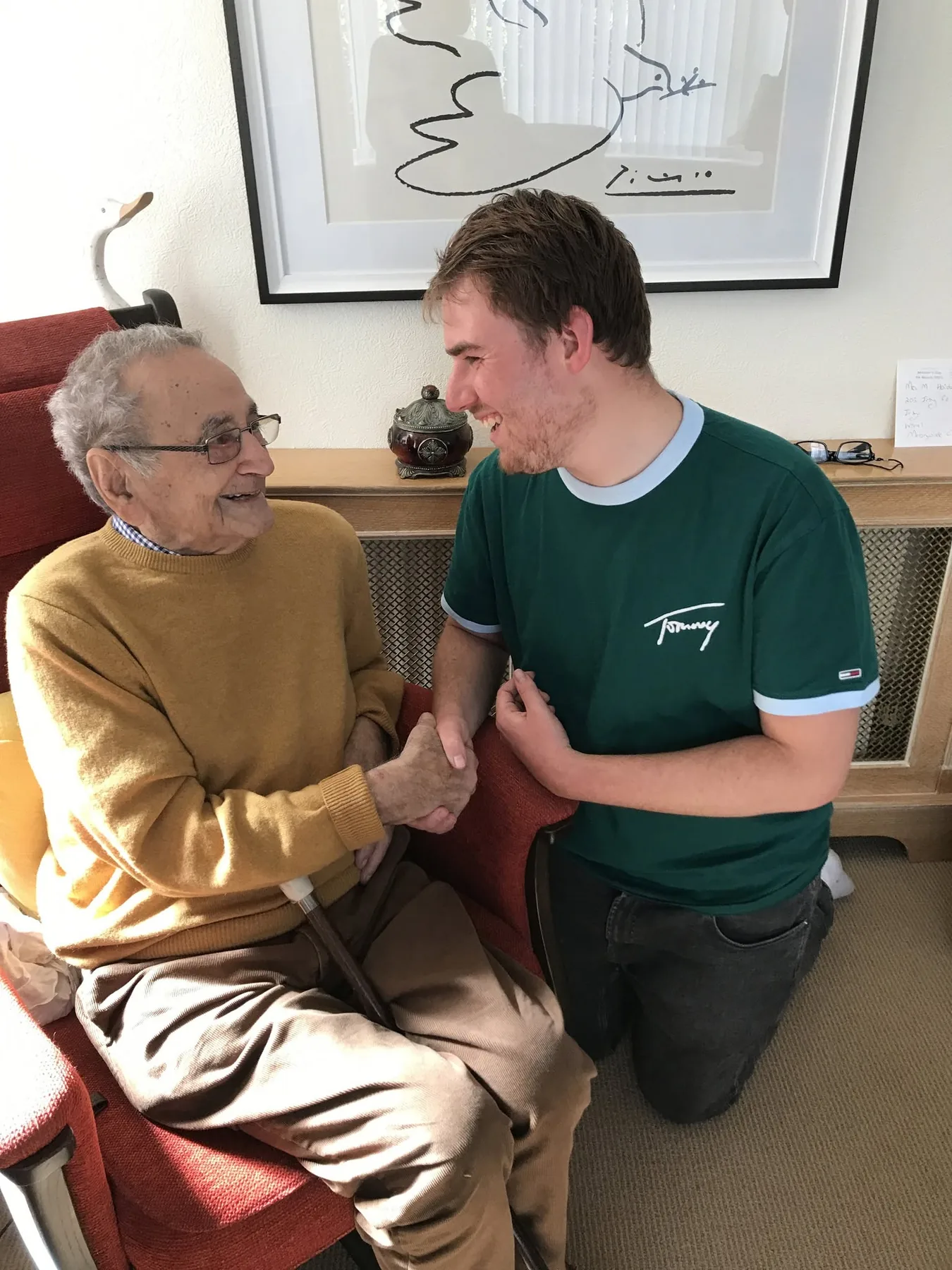Ervín Hoida shaking hands with historian Jiri Kluc.